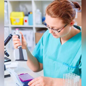 Woman working in health lab Woman working in health lab